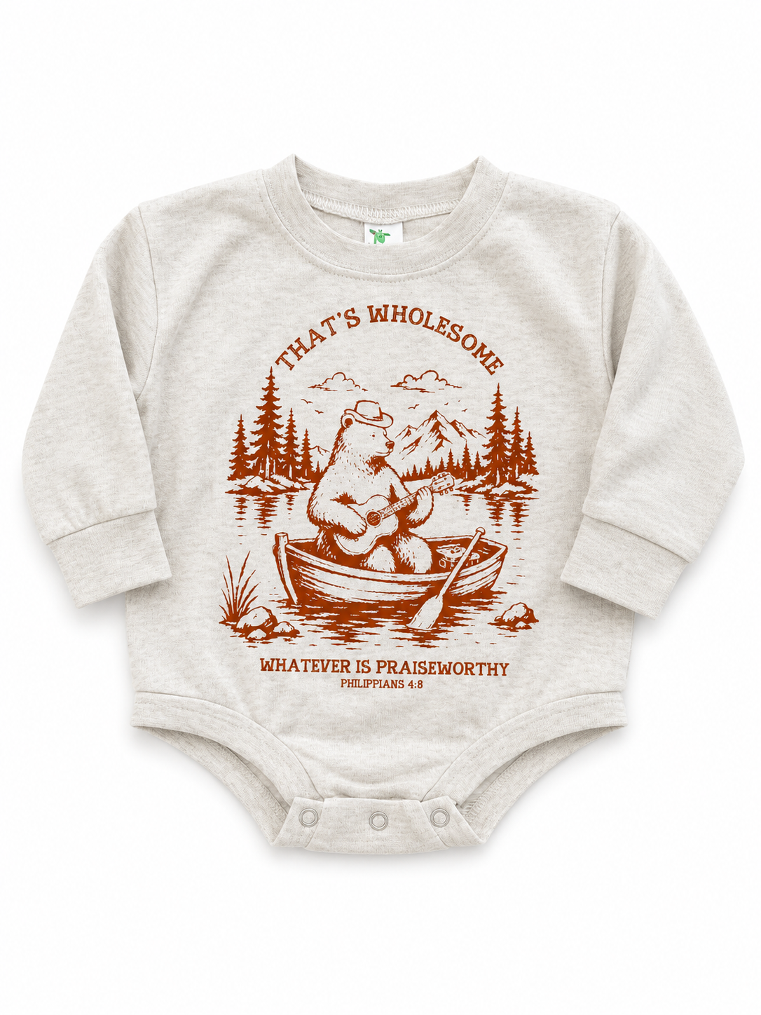 A light heather gray baby bodysuit featuring a brown graphic of a bear in a boat on a lake, with the text 'THAT'S WHOLESOME' and 'WHATEVER IS PRAISEWORTHY PHILIPPIANS 4:8'.