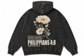 Black hoodie with floral design and text on the back against a white background