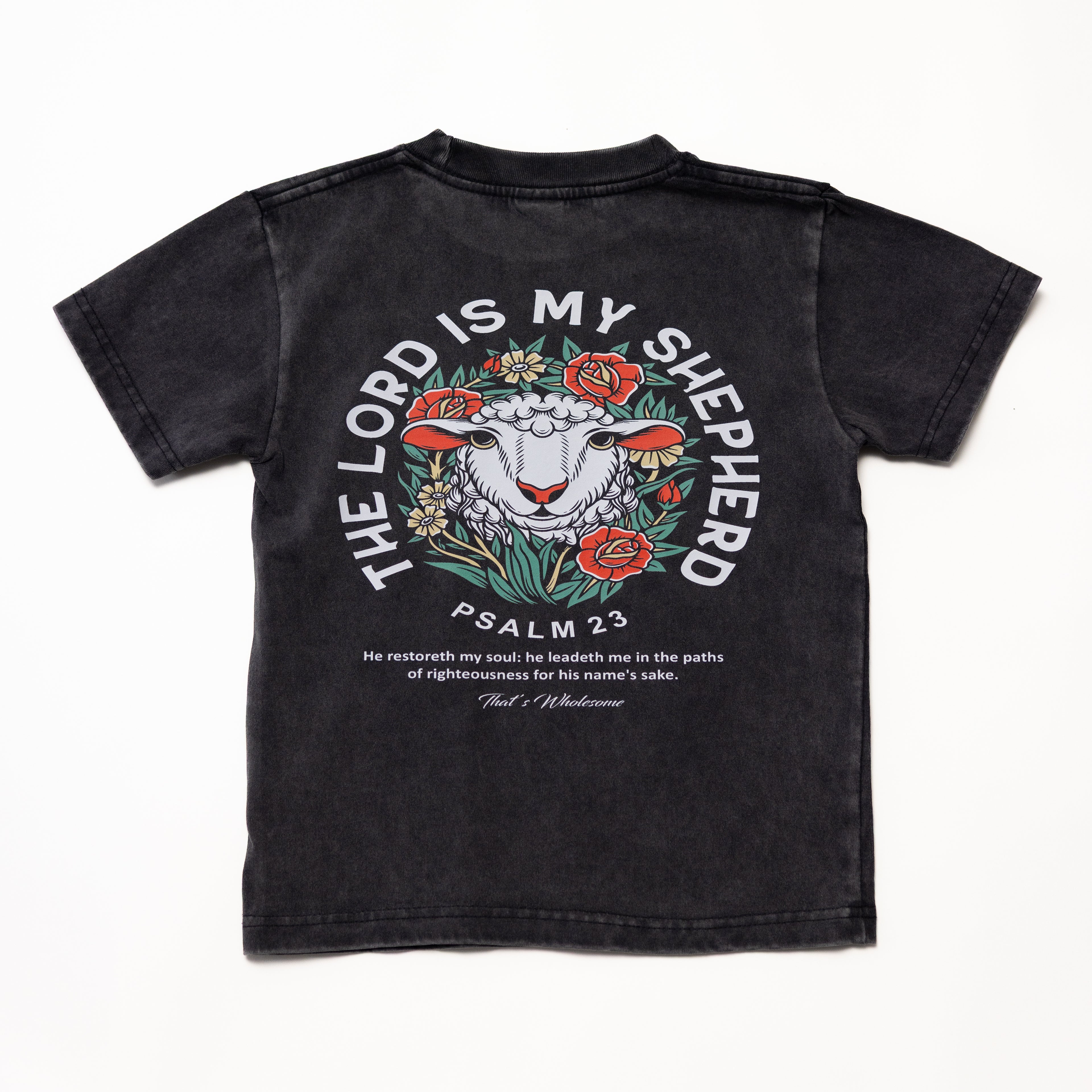 Black kids t-shirt with a sheep and floral graphic, 'The Lord Is My Shepherd' and 'Psalm 23' text on the back