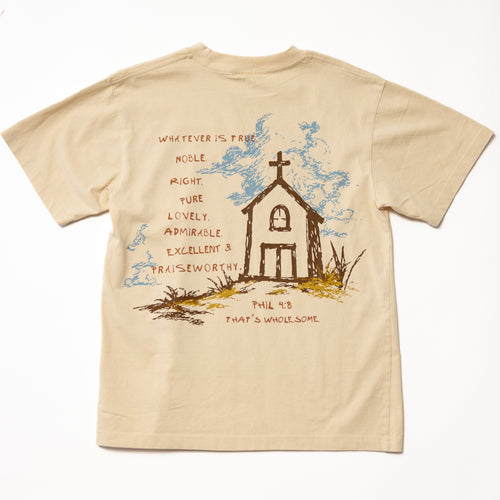 Beige t-shirt with a church illustration and text on a white background